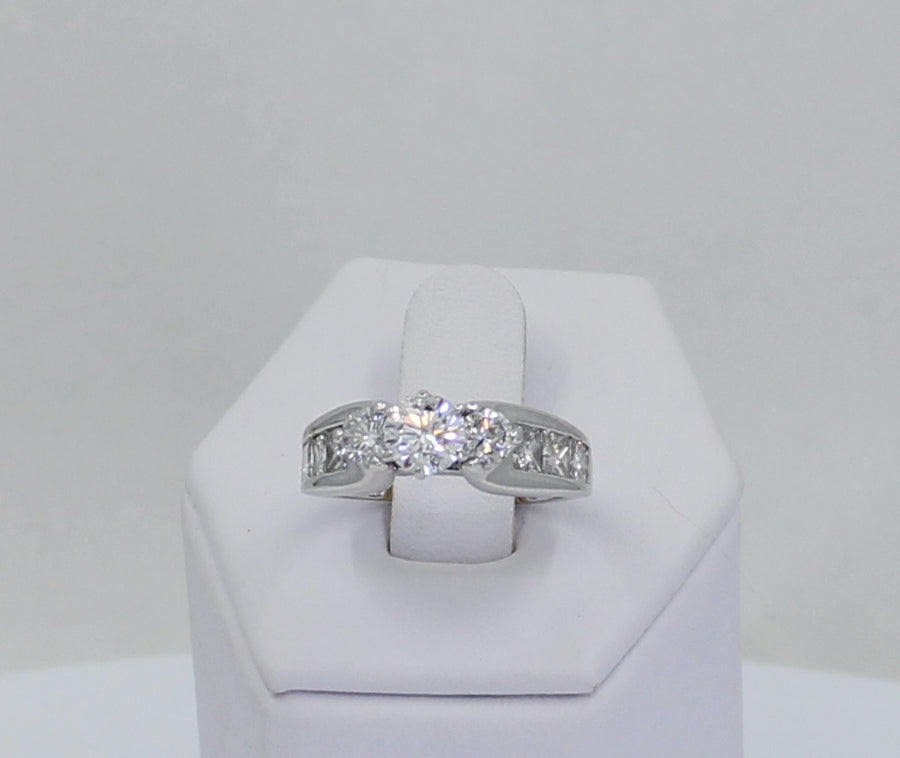 Three Stone & Princess Ring