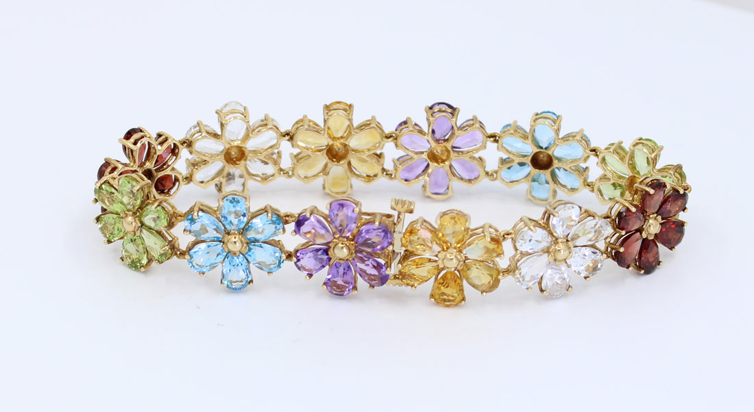 PULSERA DE FLORES CON PIEDRAS PRECIOSAS 14KT