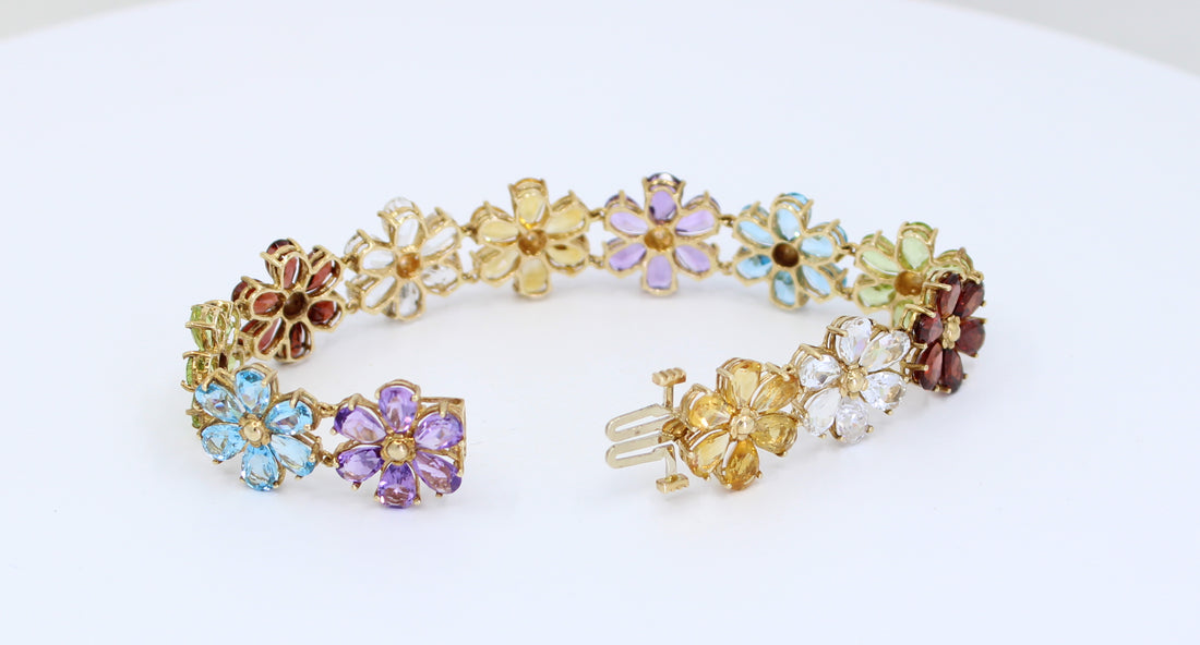 PULSERA DE FLORES CON PIEDRAS PRECIOSAS 14KT