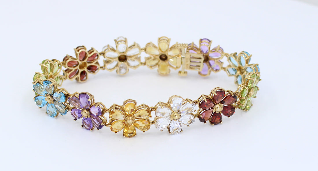 PULSERA DE FLORES CON PIEDRAS PRECIOSAS 14KT