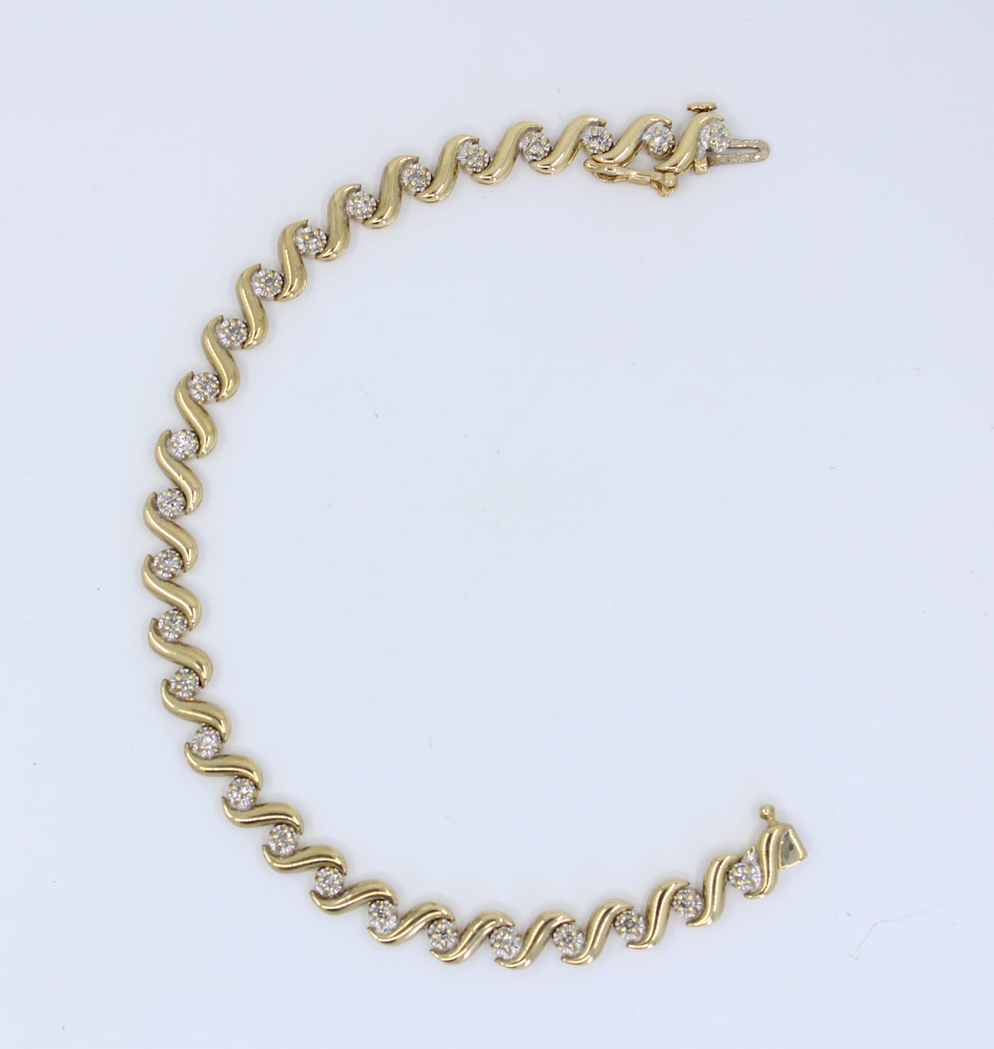 Pulsera de Diamantes y Oro Swirl